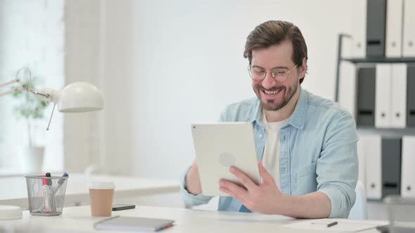 Successful Man Celebrating Tablet Work