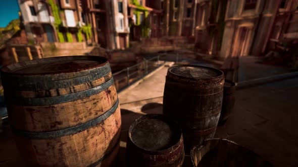 Old Wooden Wine Barrels in a Sea Town Port