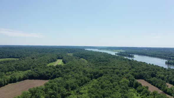 Drone Reveals the Potomac River flowing through dense forest bushland in Maryland USA, drone Aerial