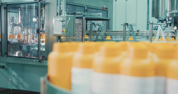 Machines in an automated chemical bottles production line