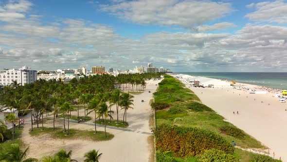 Aerial rise reveal Miami Beach Art Basel tents 4k 60fps