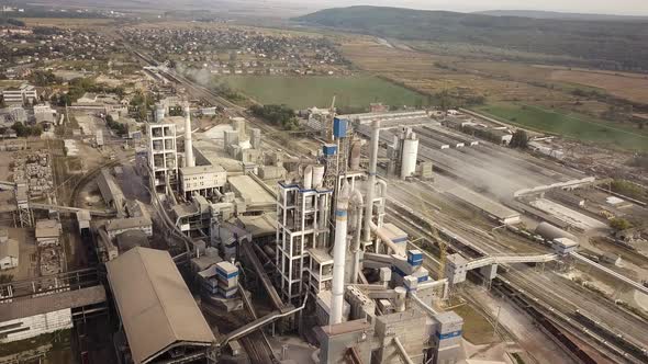 Aerial view of cement plant factory at industrial production area.