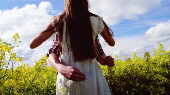 Romantic couple embracing each other in mustard field