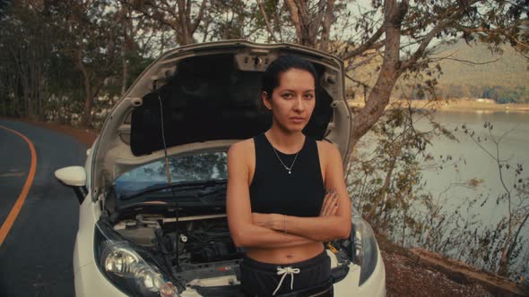 Woman Having Car Troubles on the Road