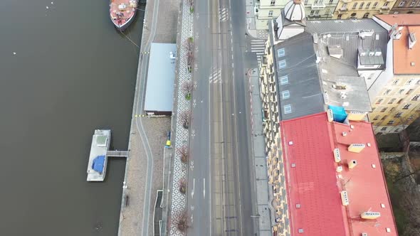 Birdseye Aerial View of a Coastal Road and Naplavka Riverwalk by Vltava, Prague Czech Republic. City