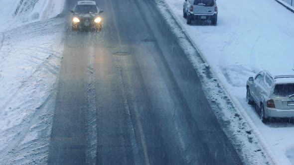 Cars On Snowy Winter Road