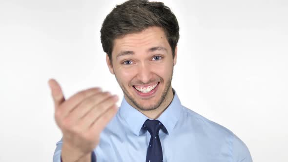 Inviting Young Businessman on White Background