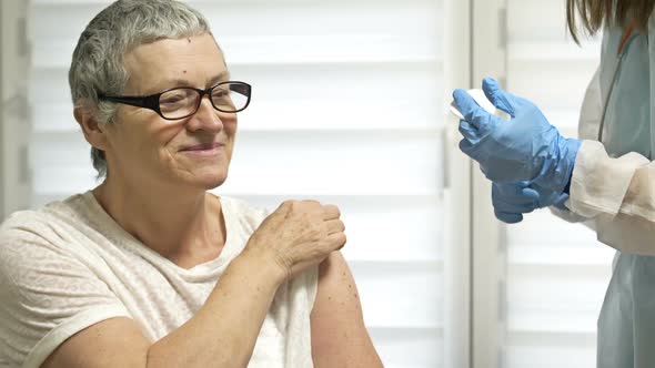 Vaccination of an Elderly Woman Against the Coronavirus