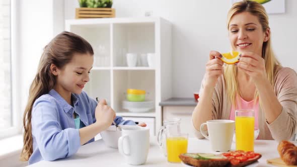 Happy Family Having Breakfast at Home Kitchen 40