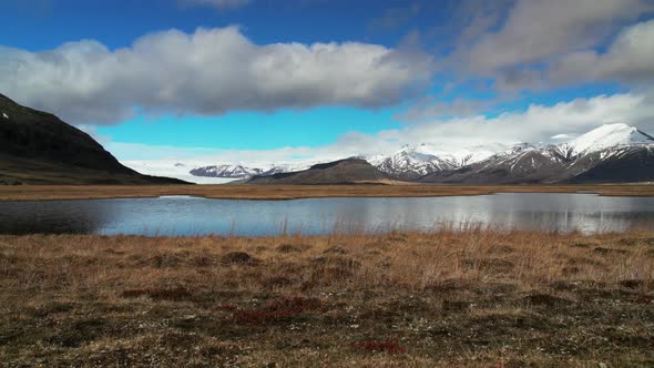 Time lapse slide from mountains with reflection 