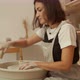 Woman Working at Pottery Wheel in Studio - VideoHive Item for Sale