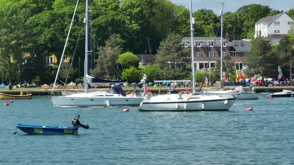 Yachts, Boats and Vessels on a River in the Summer