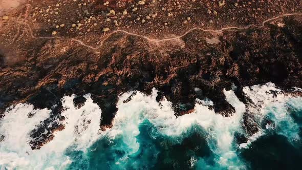 Big blue wave splash near the beach in the ocean - summer vibes and vacation concept