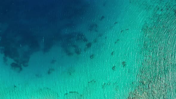 Aerial View of Clear Turquoise Water Near a Tropical Island in the Caribbean