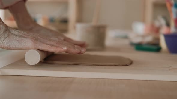 Woman Rolls Ceramist Clay Special Tool