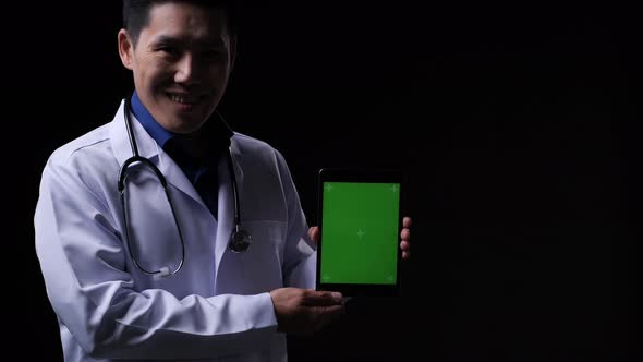 Doctor holding tablet