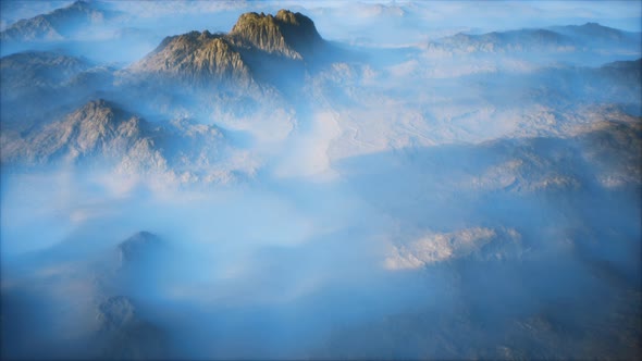 Distant Mountain Range and Thin Layer of Fog on the Valleys