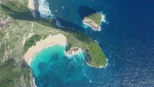 Aerial View of Kelingking Beach in Nusa Penida Island Beautiful Ocean Mountains