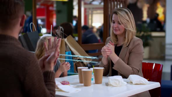 Family Use a Hand Sanitizer To Clear Their Hands