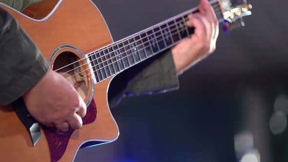 Guitar Player Playing Song Outdoor