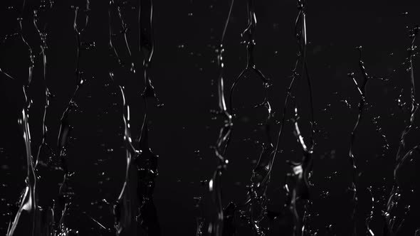 Super Slow Motion Shot of Black Glossy Paint Splash at 1000 Fps