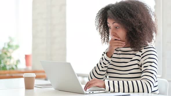 Loss, African Woman Reacting To Failure on Laptop 