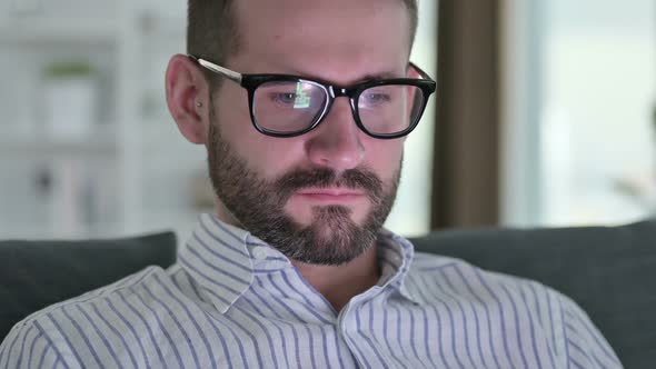 Close Up of Young Businessman Using Digital Device 