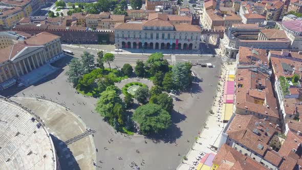 Aerial panoramic view of Arena di Verona, Italy. The drone is filming from above Bra Square