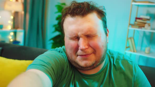 Upset Obese Man Take a Camera to Recording a Video