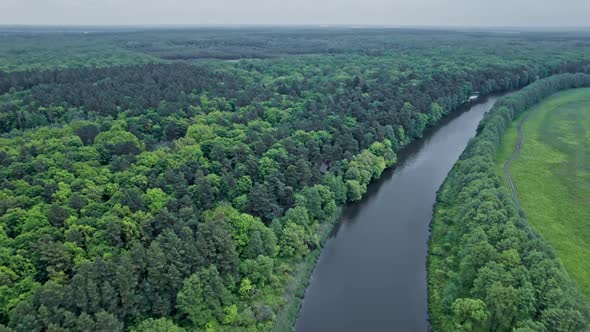 Drone Shot of Landscape with River and Field