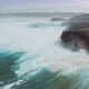 Wild ocean waves crashing againt coastal cliffs shot by drone - VideoHive Item for Sale