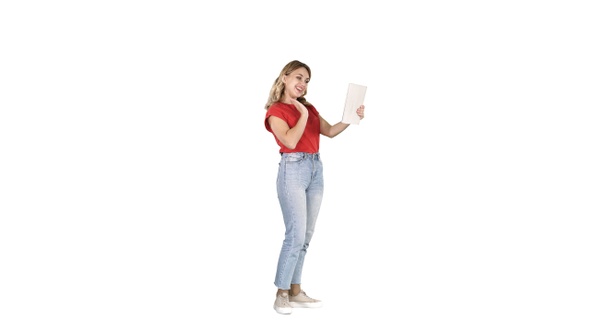 Beautiful woman making video call with tablet on white background