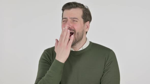 Portrait of Sleepy Man Yawning White Screen