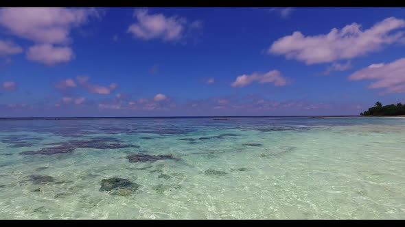 Aerial top down nature of tropical lagoon beach voyage by blue ocean with white sandy background of 