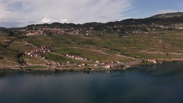 Aerial overview of scenic small town near a beautiful lake