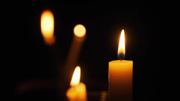 Candles Flame on Black Background