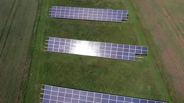 Ecology solar power station panels in the fields green energy at sunset landscape electrical innovat