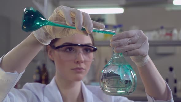 Attractive Professional Scientist Carrying Out Experiments