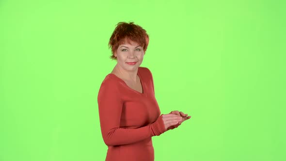 Redhaired Woman Dancing Sexual Movements. Green Screen