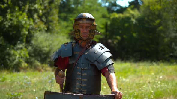 Fearless Roman soldier with armor, ultra slow motion