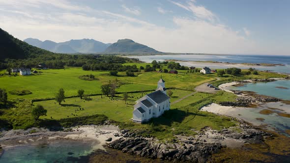 Flying Around Gimsoy Church in Gimsoysand Village Lofoten Islands Norway