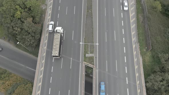 Drone View Of Busy M50 Motorway In Dublin, Ireland At Daytime. aerial tilt-up