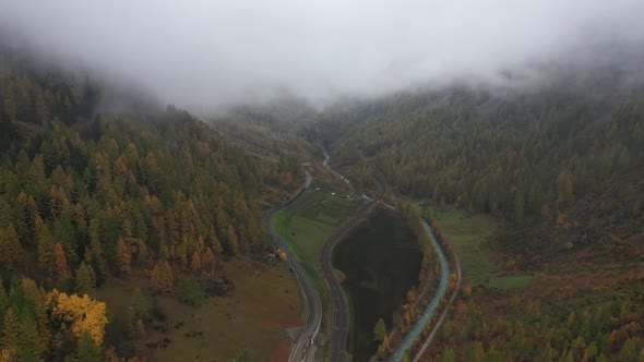 Aerial view of a waving road in countryside, Ardon, Switzerland.