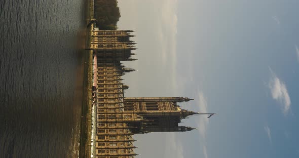 Vertical video of timelapse of London River Thames and Houses of Parliament, the iconic building, ti