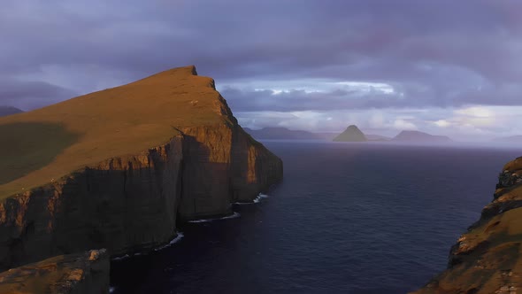 Aerial View of Golden Expanse of Land During Sunset