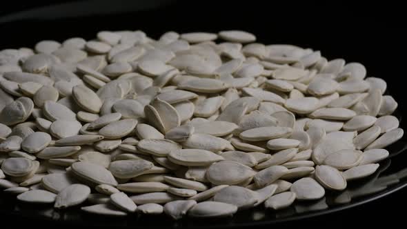 Cinematic, rotating shot of pumpking seeds - PUMPKIN SEEDS 036