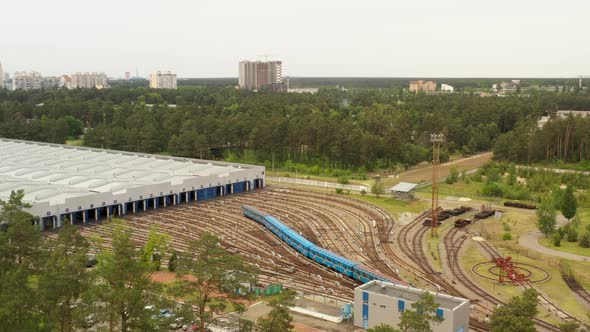 Aerial moving right above railway hub