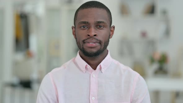 Portrait of Serious African Man Looking at the Camera 