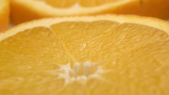 Orange Slices Closeup, Macro Food Summer Background, Fruits Top View. Rotate