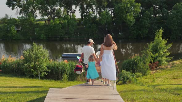 Family with Children Going to Have a Picnic and Have Fun Together